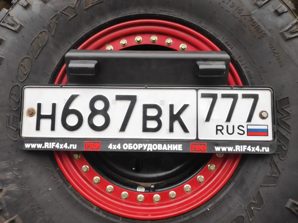 Бампер РИФ силовой задний Mitsubishi L200 2015-2019 с фонарями, калиткой, подсветкой номера, без фаркопа